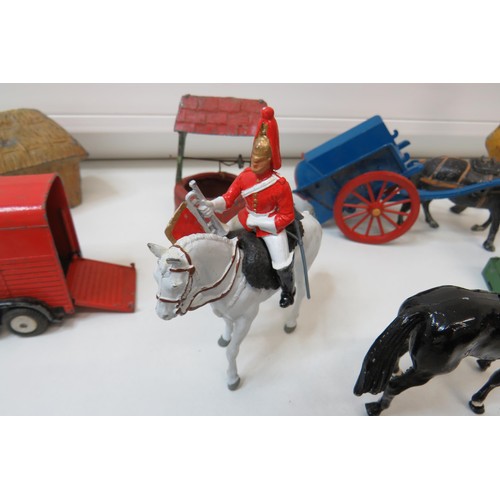 261 - Vintage toys to include Britains Farm and Zoo animals, figures, trailers and Corgi pony trailer.