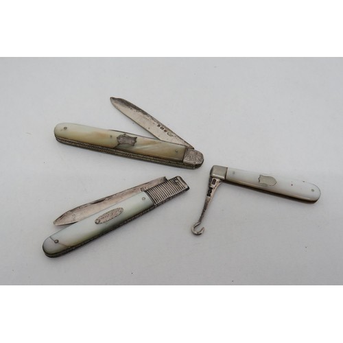 24 - Two mother of pearl sterling silver fruit knives and mother of pearl sterling silver button hook