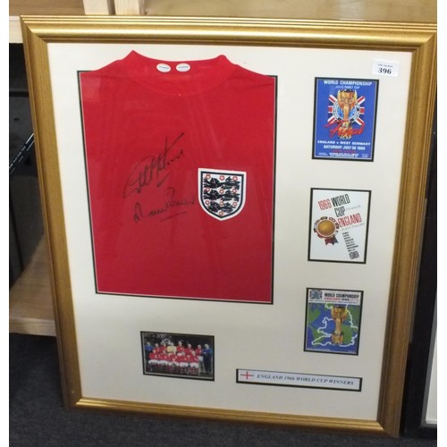 396 - Framed 1966 replica England shirt Autographed by Geoff Hurst and Martin Peters with C.O.A