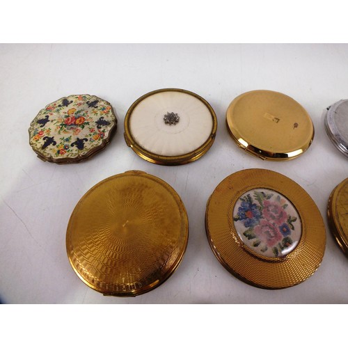 434 - Nine assorted Gold Tone Powder compacts.