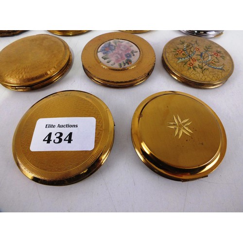 434 - Nine assorted Gold Tone Powder compacts.