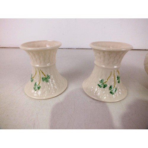 435 - Boxed Belleek china, snowflake candle holder and a pair of Shamrock candlesticks - as new.