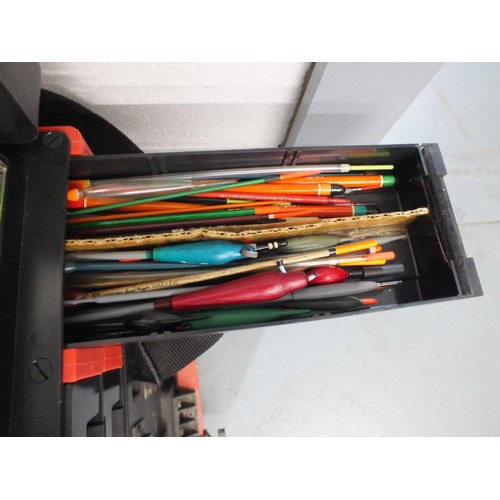 373 - Fishing tackle box/ seat with large amount of lures/ floats etc