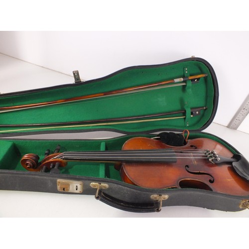 387 - Violin in case