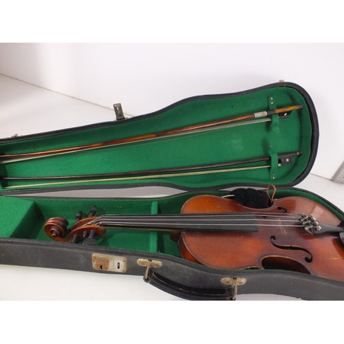 387 - Violin in case