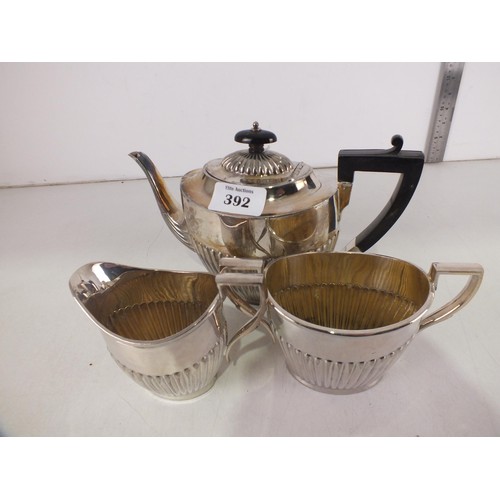 392 - Silverplate teapot, milk jug and sugar pot- engraved 