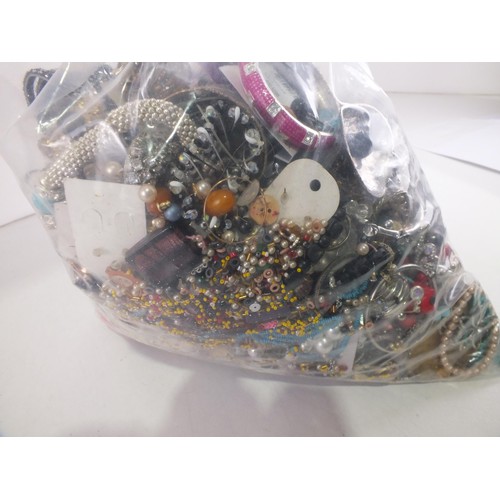 80 - 10kg of unsorted costume jewellery.