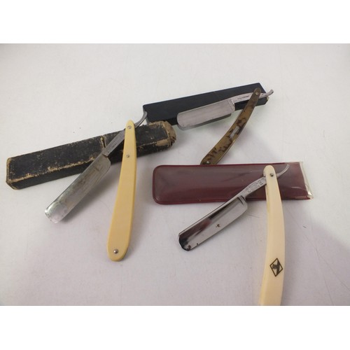 401 - Three cased cut throat razors including eye witness, Solingen and Depose