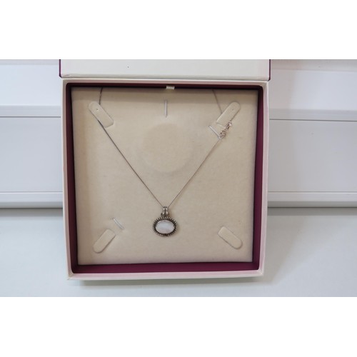 56 - Boxed 925 Silver Mother of pearl pendant necklace.