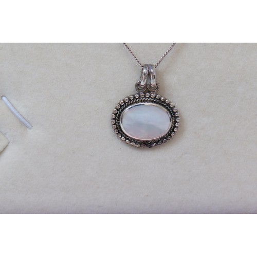 56 - Boxed 925 Silver Mother of pearl pendant necklace.