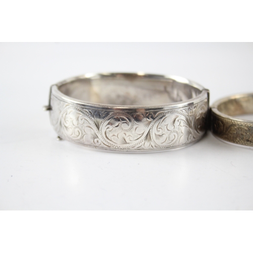 12 - Two Sterling Silver Mid Century Bangles inc. Scrolling, Etched 63g