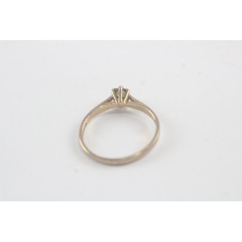 19 - 9ct gold diamond set solitaire ring (1.3g)- Size M