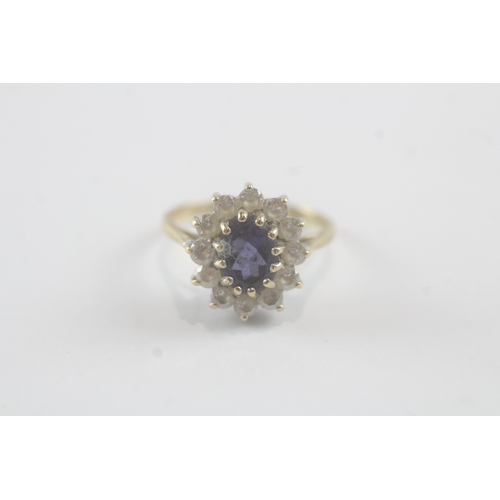 21 - 9ct gold cubic zirconia and iolite set cluster ring (2.5g)- Size L