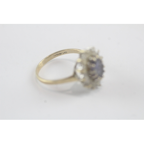 21 - 9ct gold cubic zirconia and iolite set cluster ring (2.5g)- Size L