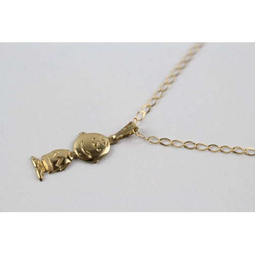 49 - 9ct gold 'charlie brown' pendant on chain (1.1g)