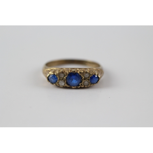 61 - 9ct gold blue and white gemstone flat setting ring (2.4g)- Size N