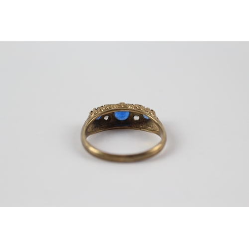 61 - 9ct gold blue and white gemstone flat setting ring (2.4g)- Size N