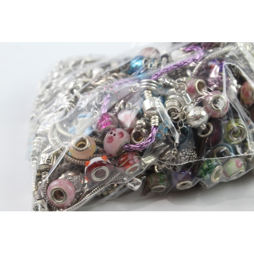 64 - Assortment of Fashion Charm Jewellery inc. Bracelets, Charms 1490g