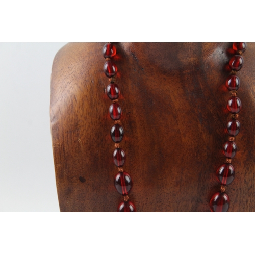 76 - Cherry Bakelite Graduated Necklace, Individually Knotted, Screw Clasp 46g