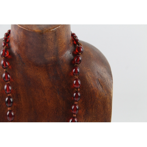 76 - Cherry Bakelite Graduated Necklace, Individually Knotted, Screw Clasp 46g