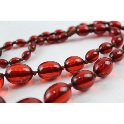 76 - Cherry Bakelite Graduated Necklace, Individually Knotted, Screw Clasp 46g