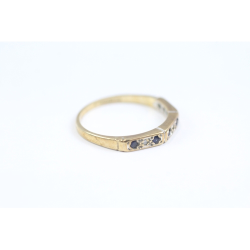 81 - 9ct gold diamond and sapphire set eternity ring (1.4g)- Size L