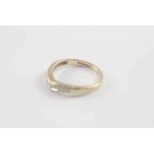 89 - 9ct gold diamond set wishbone eternity ring (1.8g)- Size N