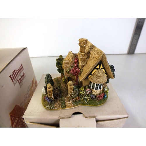 106 - Five boxed Lilliput lane figures including pear tree house, creel cottage, pretty as a picture and l... 