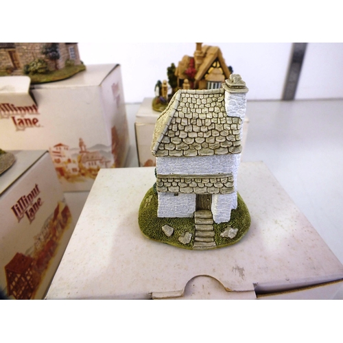 106 - Five boxed Lilliput lane figures including pear tree house, creel cottage, pretty as a picture and l... 