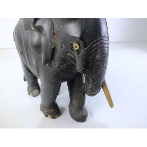 115 - Pair of wooden elephants - as seen