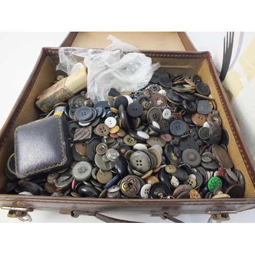 128 - One large box and suitcase of old buttons