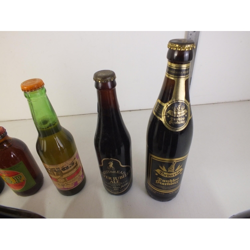 129 - Thirteen bottles of various beers, jubilee, tsinoto porter, bavarian tiawan beer, real steam beer, v... 