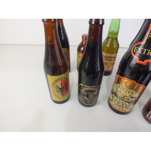 129 - Thirteen bottles of various beers, jubilee, tsinoto porter, bavarian tiawan beer, real steam beer, v... 