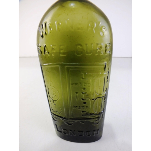 145 - Warners safe cure green glass bottle