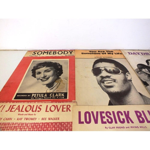 149 - Ten vintage pop sheet music and world