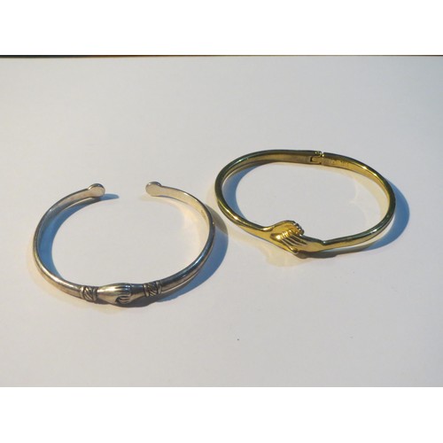 74 - S925 Sterling Silver hugging hands bangle and gold tone hugging hands bangle.