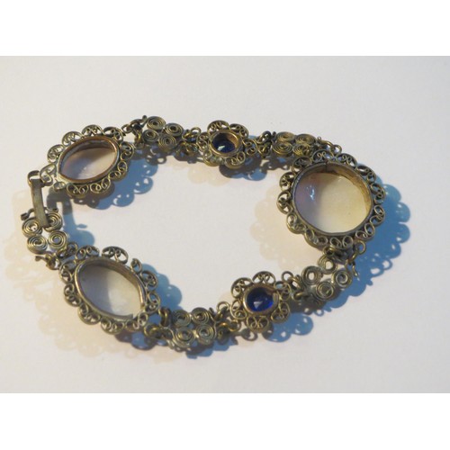 83 - Vintage silver filigree hand carved shell cabochon and blue stone bracelet, 7.5