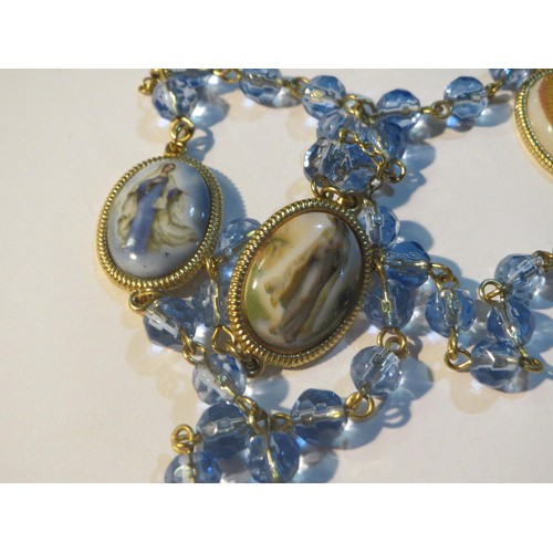 91 - Gold tone Blue glass and Porcelain Rosary.