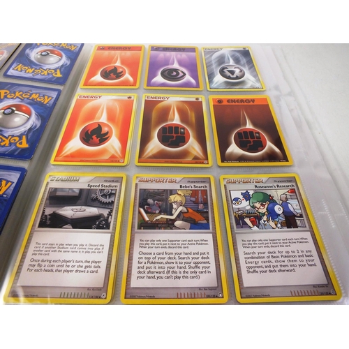 26 - Album of pokemon cards plus small number of dinosaur king