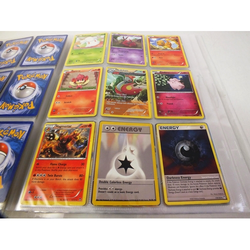 26 - Album of pokemon cards plus small number of dinosaur king