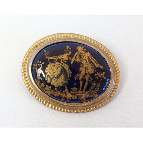 69 - Vintage Limoges France Cobalt blue and 9ct gold painted courting couple brooch.