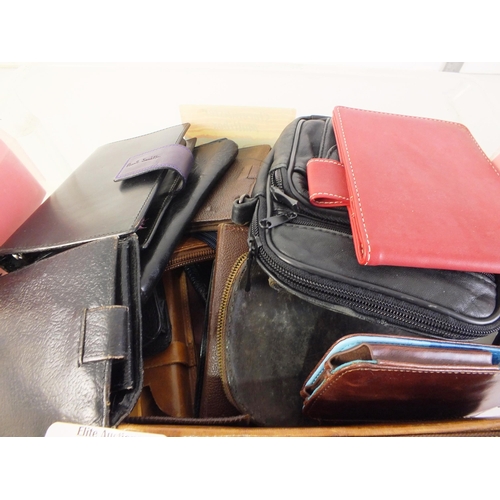 303 - Fifty vintage leather wallets