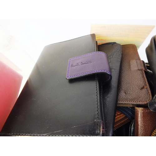 303 - Fifty vintage leather wallets