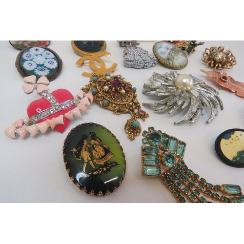 268 - Eighteen Brooches and clips including vintage crystal, hand painted porcelain etc.