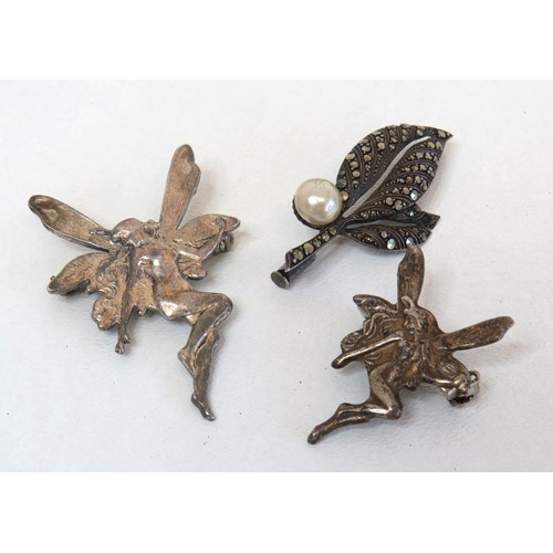 270 - Three silver brooches, fairies and marcasite.