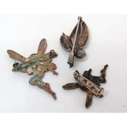 270 - Three silver brooches, fairies and marcasite.