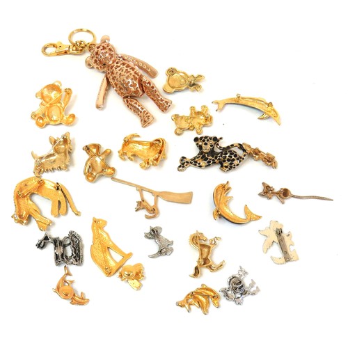 272 - Twenty three assorted brooches including dolphins, animals, teddies and a large gold tone teddy bear... 