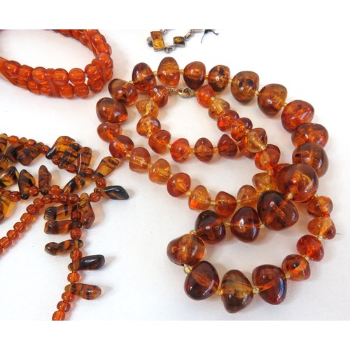 274 - Collection of Amber and faux amber Jewellery.