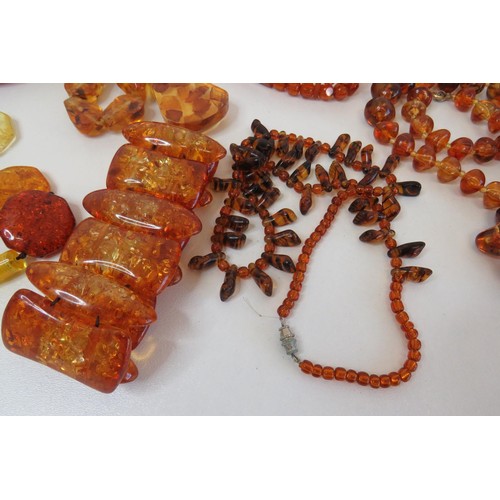 274 - Collection of Amber and faux amber Jewellery.