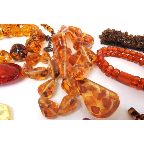 274 - Collection of Amber and faux amber Jewellery.